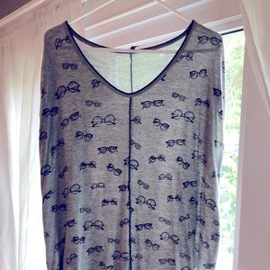 Fun grey shirt with cute slit in back!